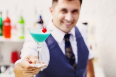 bartender with a cocktail drink